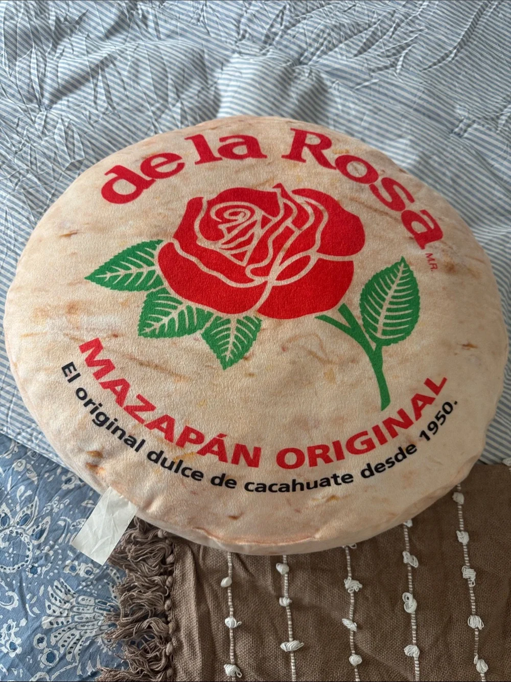 de la Rosa Round Logo Pillow - Red Rose Print
